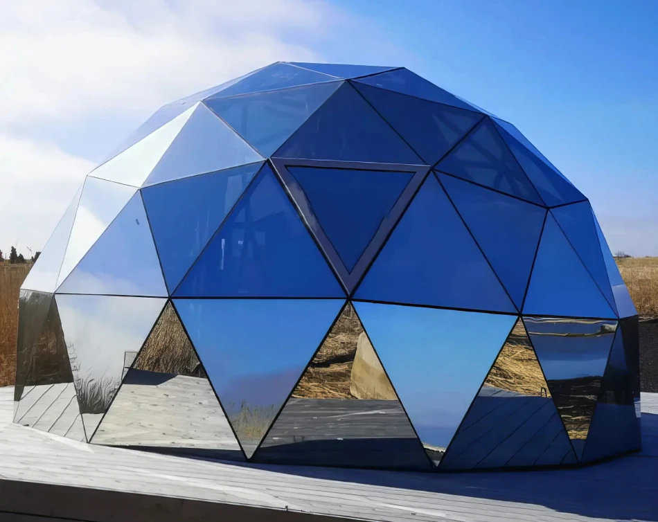 Mirrored glass geodesic dome kit on a deck